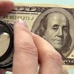 Гомельчанин рассчитался за гараж фальшивыми долларами